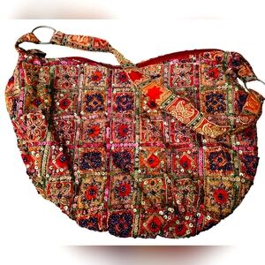 Coldwater Creek Beautuful Beaded Multi-Colored Purse with Burgandy lining.